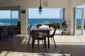 Seafront house with a view